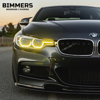 Närbild på LED-strålkastare till BMW F30 LCI som visar den gula CSL färgen på DRL