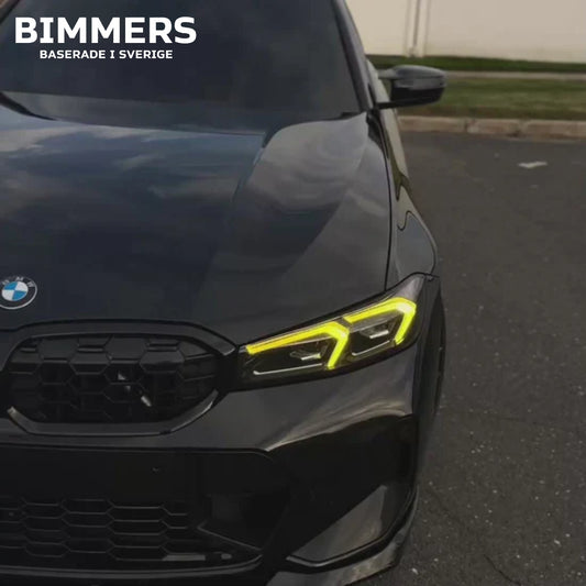 Närbild på BMW Laser-strålkastare med integrerade gula DRL-moduler från Bimmers.