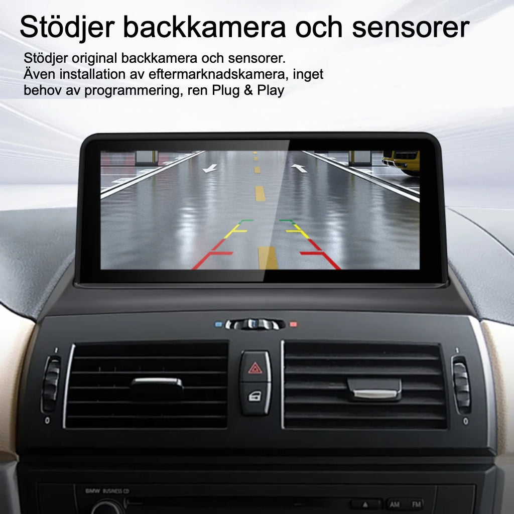 Bimmers Androidskärm för BMW X3 E83 stödjer backkamera och sensorer.