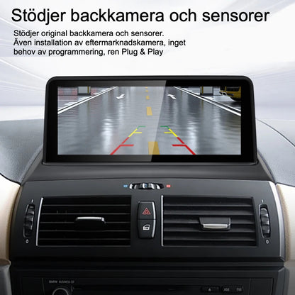 Bimmers Androidskärm för BMW X3 E83 stödjer backkamera och sensorer.