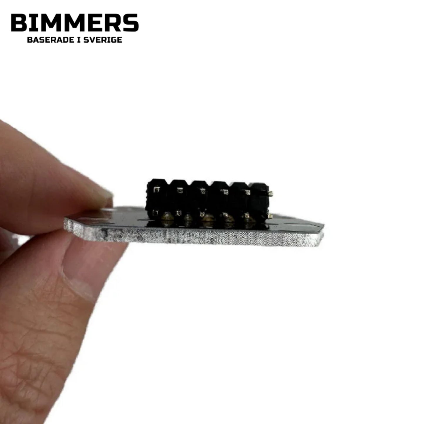Sidobild av en gul CSL DRL modul till en BMW F20 och F21